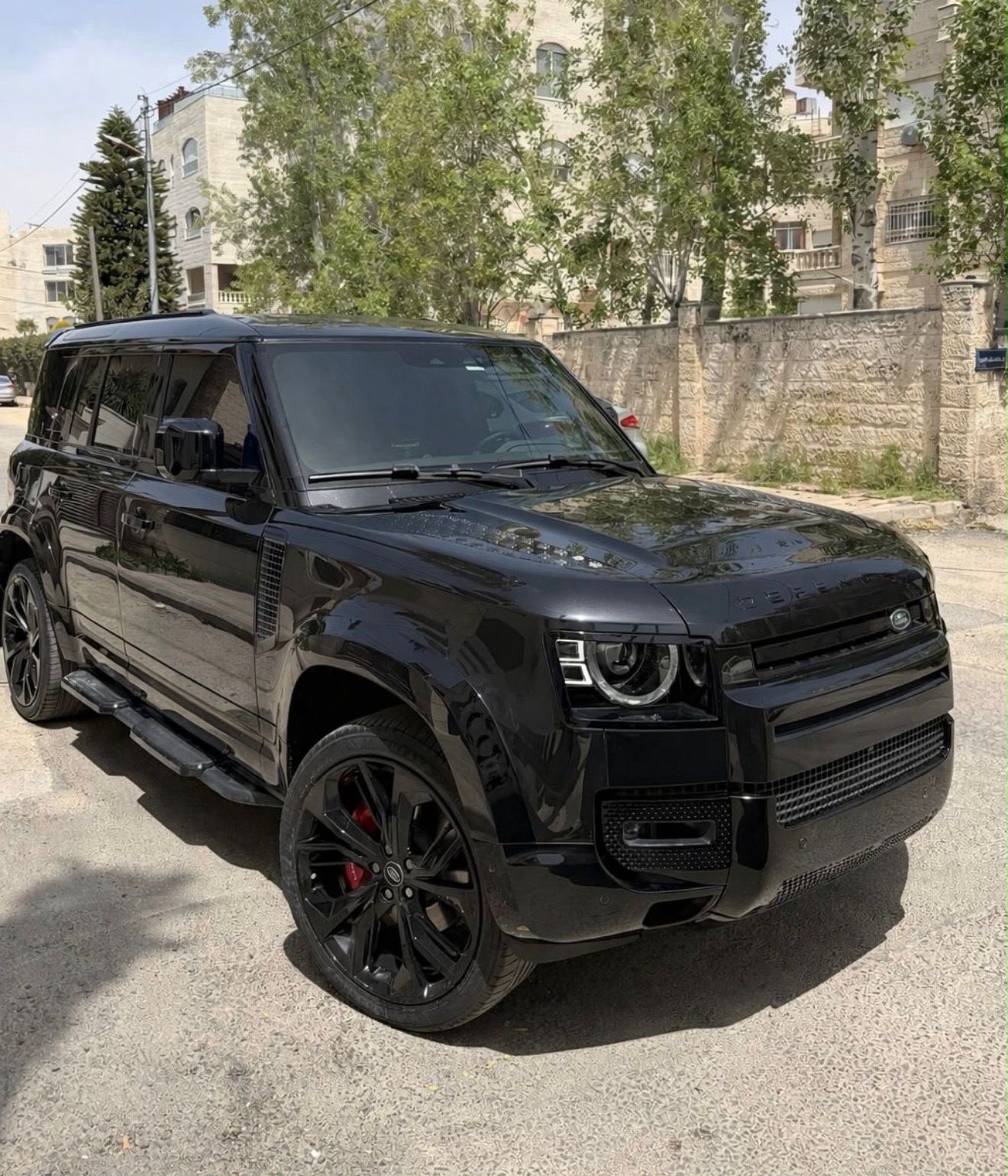 Black Land Rover Defender rental in Amman Jordan